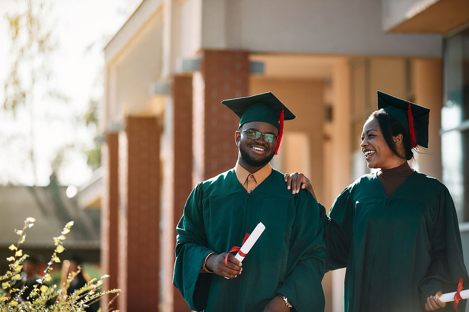 happy-african-american-students-on-their-graduatio-2023-02-02-19-03-30-utc.jpg
