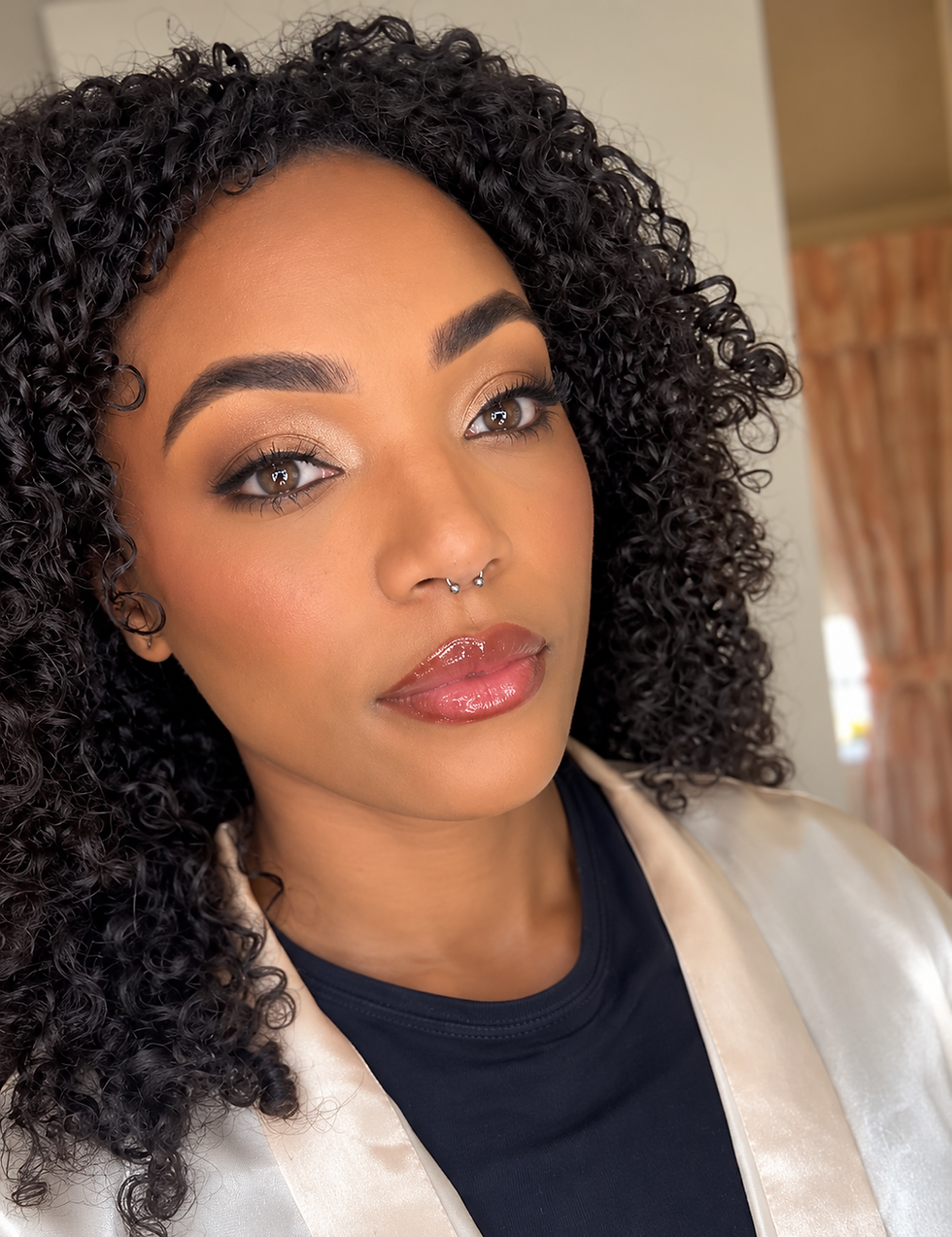 Glamorous Curly-Haired Beauty Portrait.png