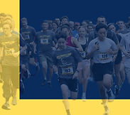 Runners participating in a nonprofit 1-mile fun run and 5K community charity fundraiser.