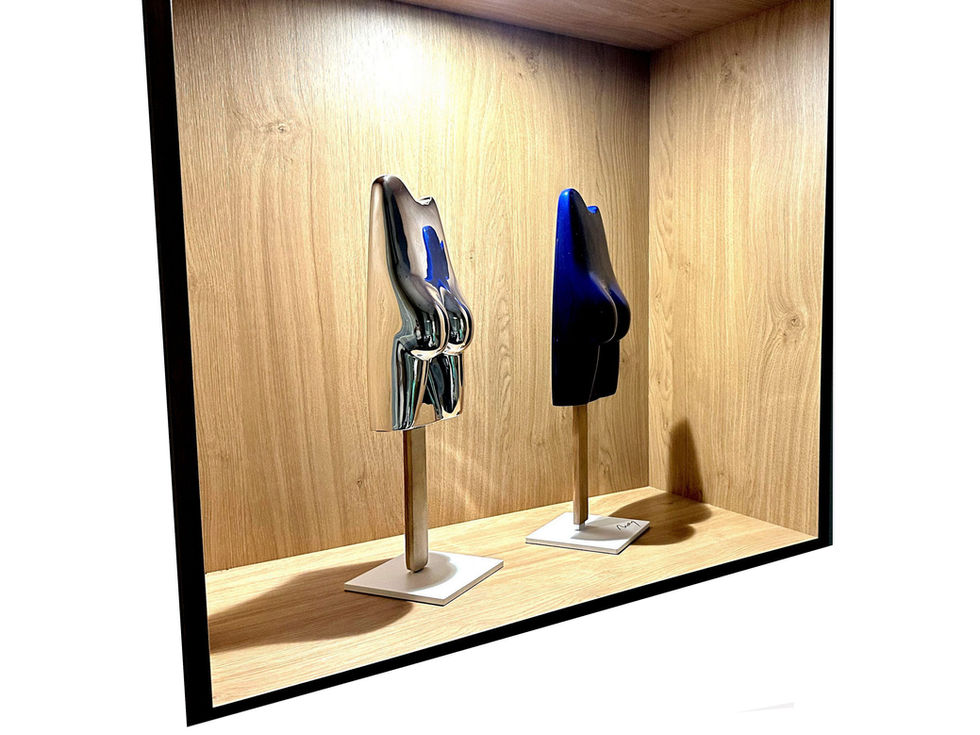 deux magnifiques sculptures contemporaines en résine chromées - Arson