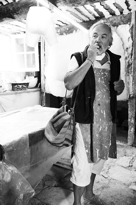 Sculptor in his workshop