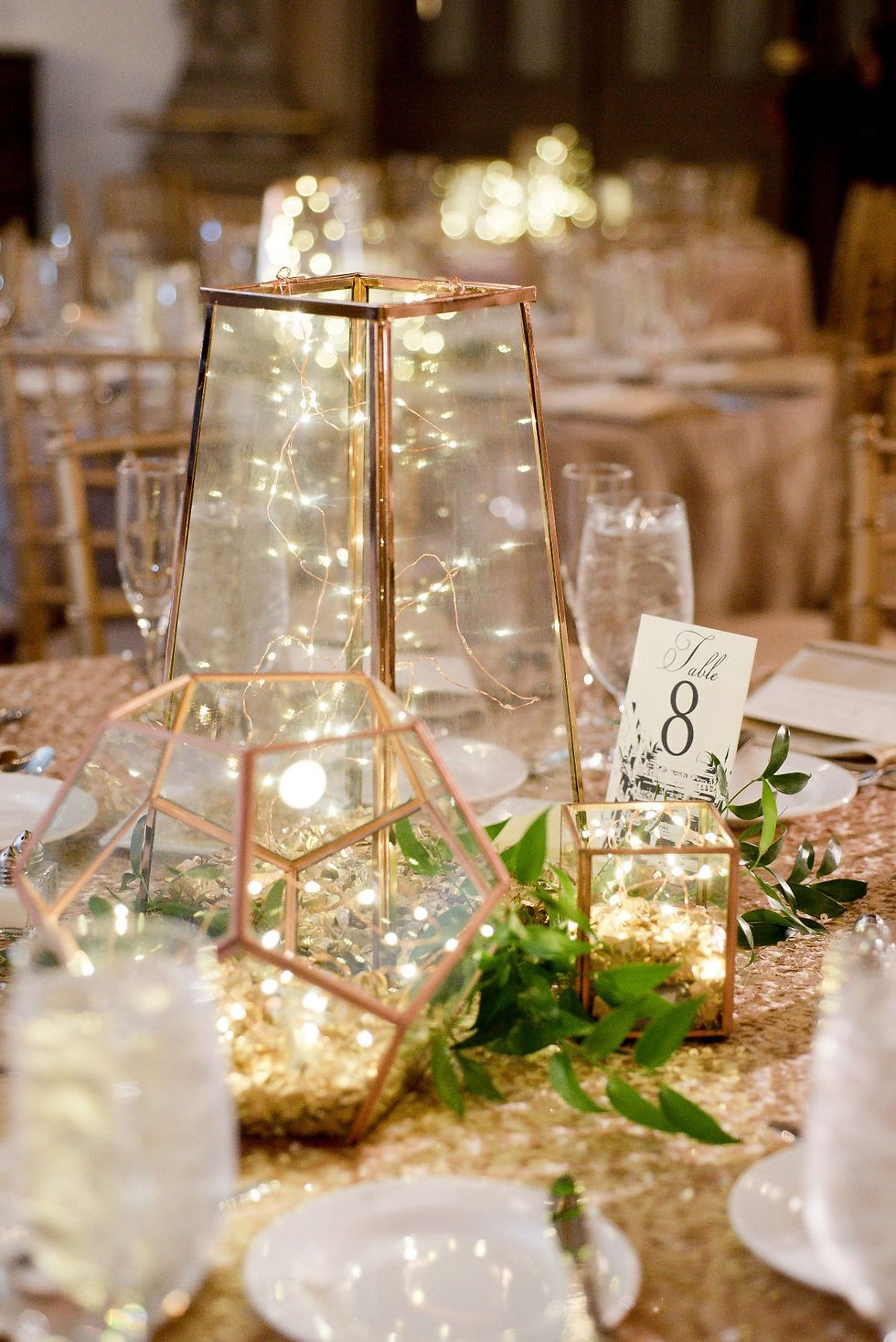 fairy lights in glass vases wedding table decor