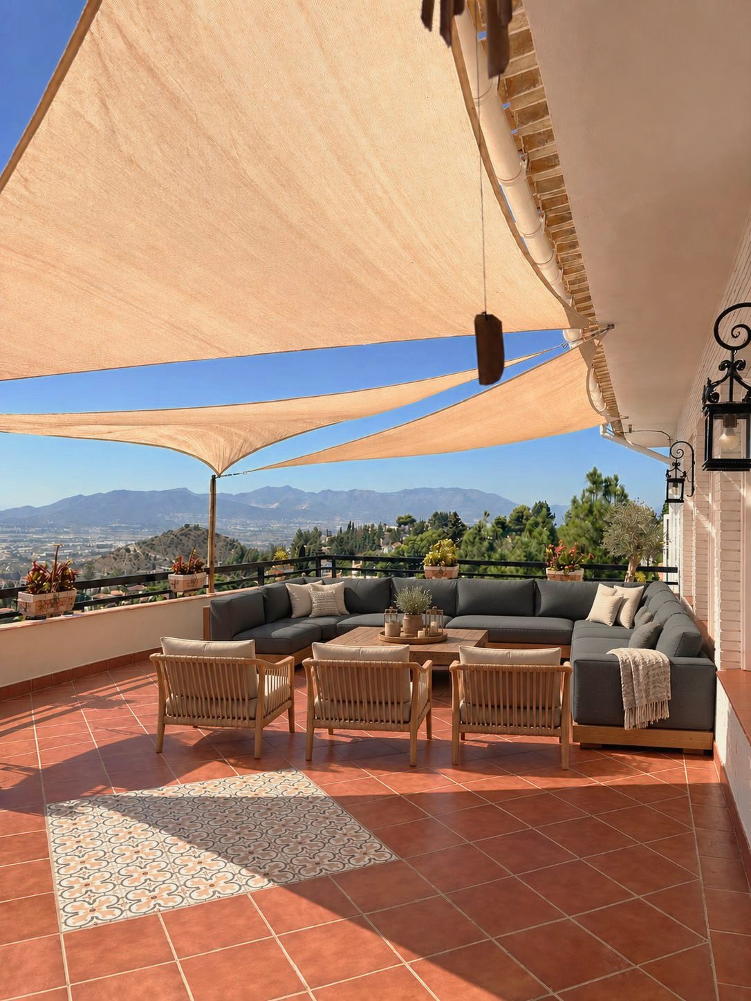 Lounge terrace under sail shades with views of the mountains