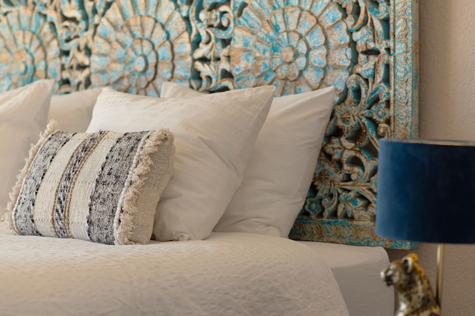 Musa Suite: headboard and bedding detail