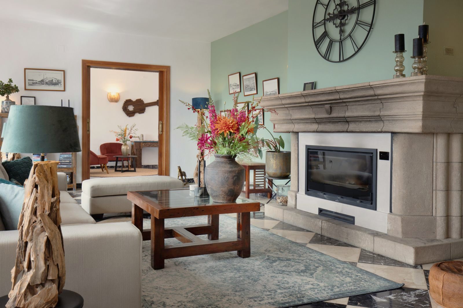 Salon with an open fireplace