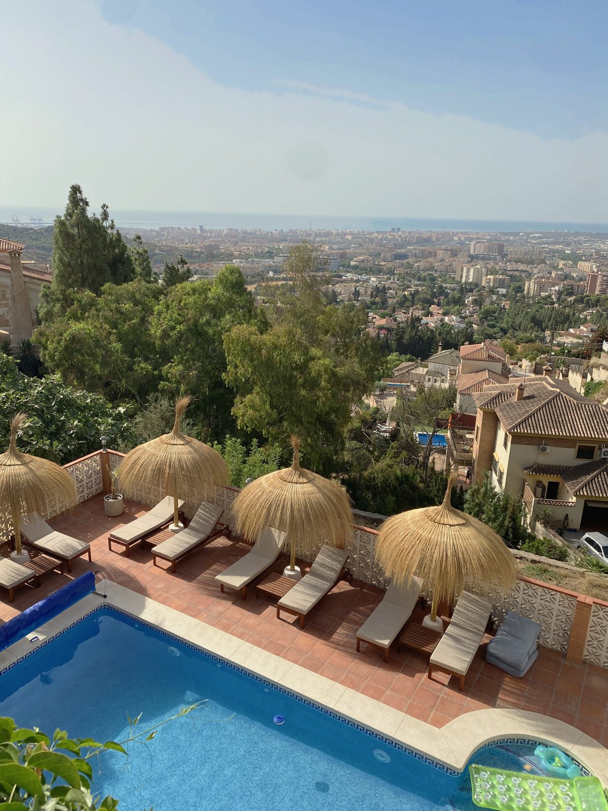 Private pool and sun loungers overlooking Málaga