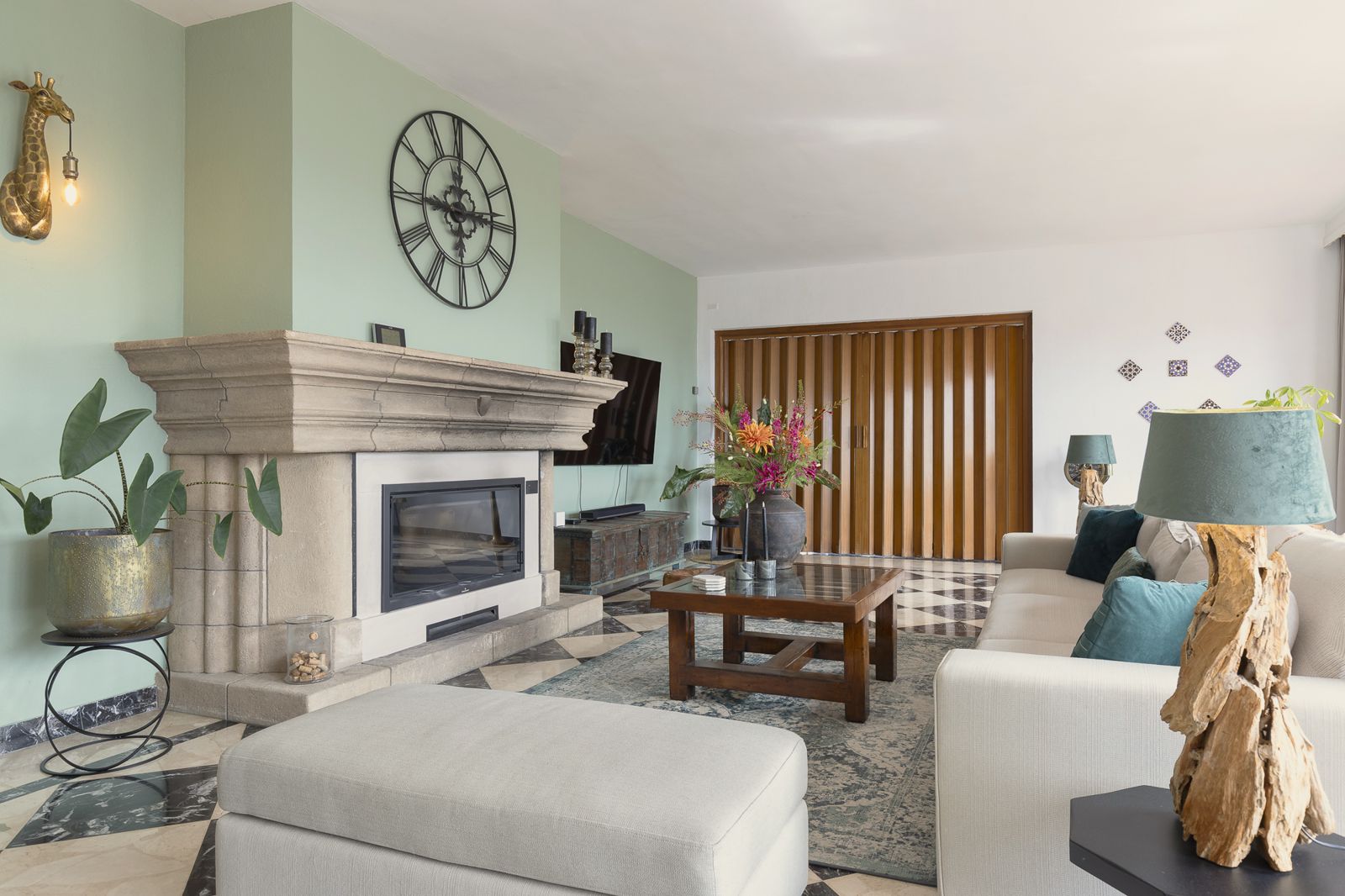 Living room with fireplace and sofas