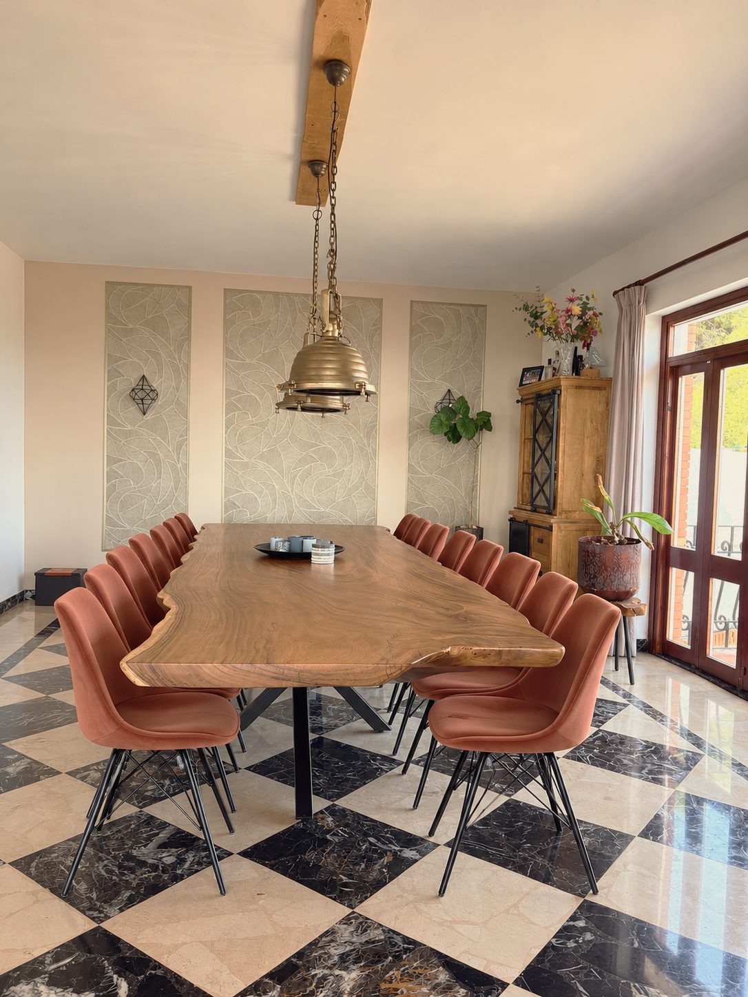 Dining room with a long wooden table for 15 guests