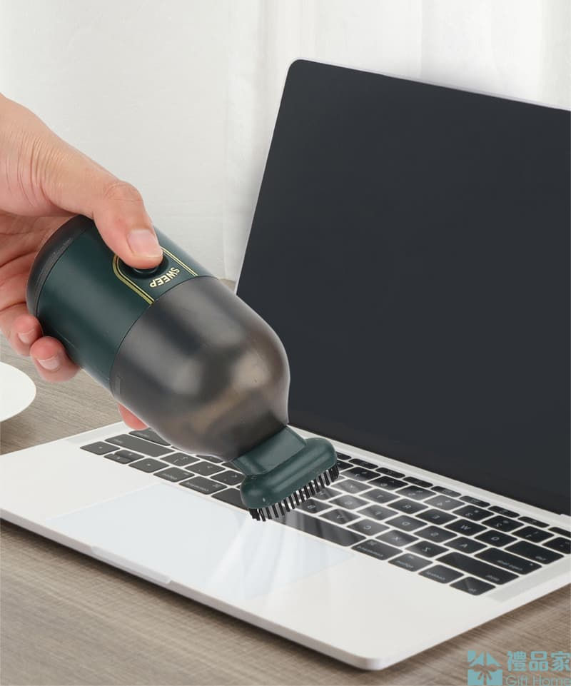 Thumbnail: 迷你手持吸塵器