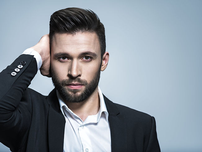 handsome-man-black-suit-with-white-shirt-posing-attractive-guy-with-fashion-hairstyle-conf
