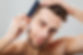 close-up-portrait-smiling-man-combing-his-hair-min-min.jpeg