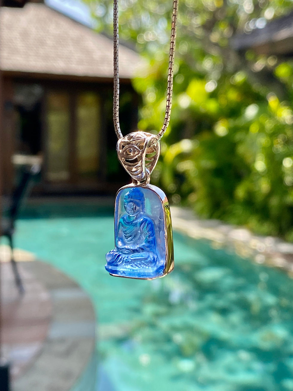 Thumbnail: Hand Carved Siberian Blue Crystal Buddha Pendant: Sterling Silver Amulet