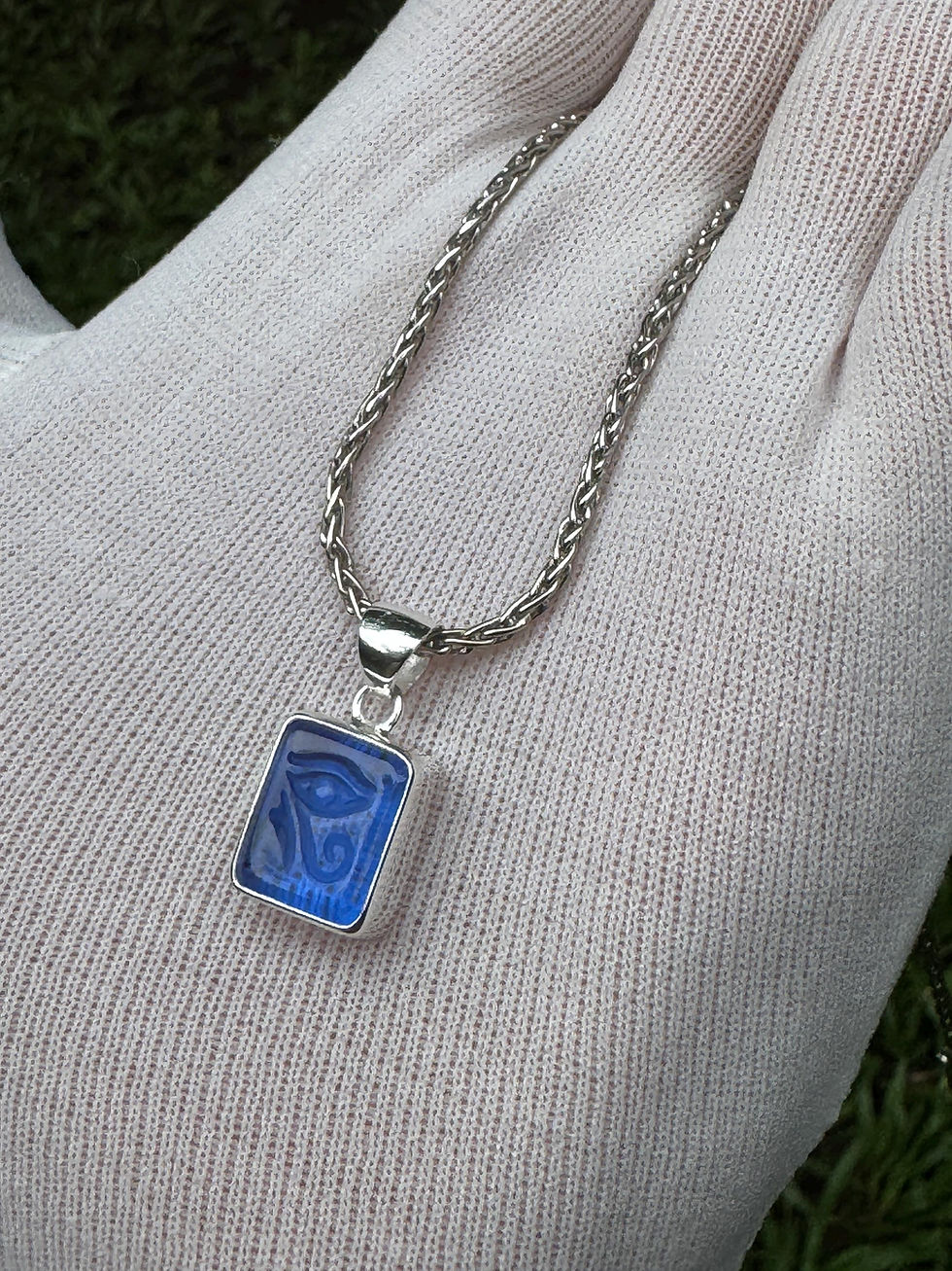Thumbnail: Hand Carved Eye of Horus Pendant: Siberian Blue Crystal Talisman
