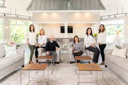Southern pInes company headshot group posing indoors
