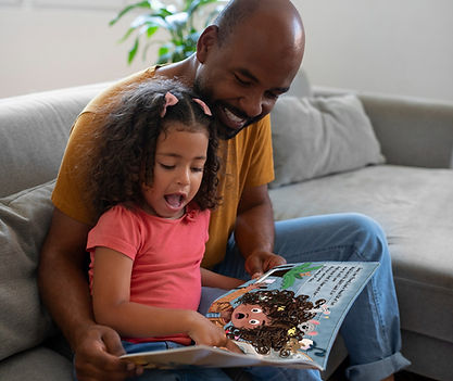 Dad reading Molly & Dane to girl.jpg