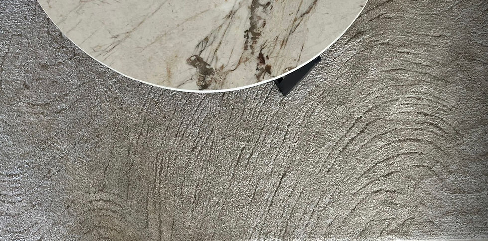 coffee table on the run, beautiful stone veining and rug patterns