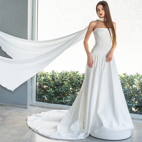 Bride wearing luxury wedding gown at La Reverie Bridal boutique in Miami