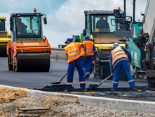 Construction progress milestones A-M on Oman's Sinaw-Duqm highway upgrade project showing key development phases from planning to completion