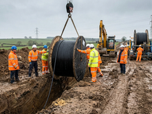High voltage underground cable installation trench at a UK grid reinforcement construction site