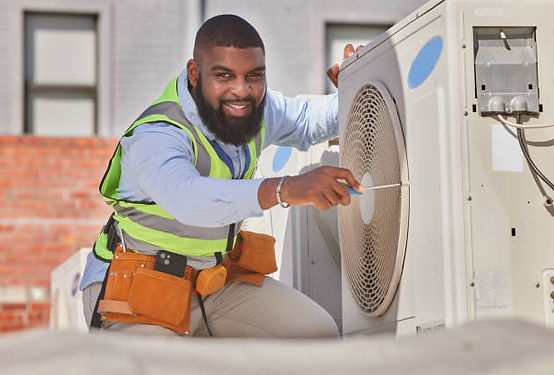 HVAC Technician Servicing a Unit.