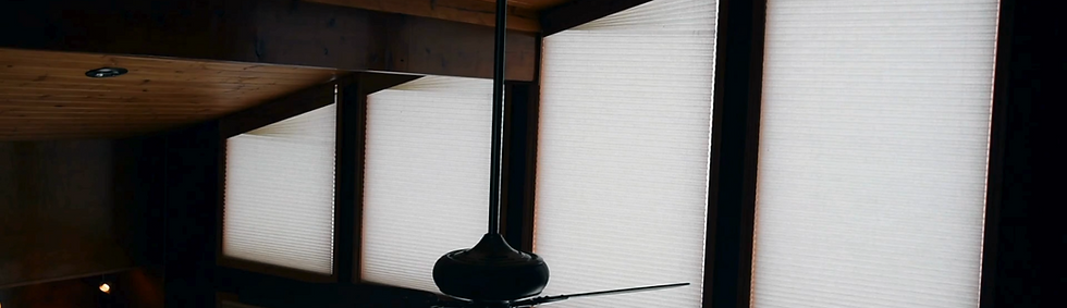 Custom pleated angled blinds on unique slanted window installation