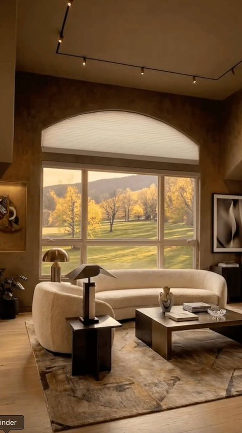 Custom arched window blinds by Blind Corners and Curves, featuring light-filtering cellular fabrics that offer precise UV protection and glare control for architectural half-circle windows in Denver, Aurora, Parker, and Castle Rock.