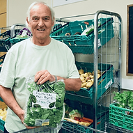volunteer in very green grocery