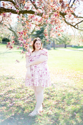 Portrait session outdoors under blooming tree