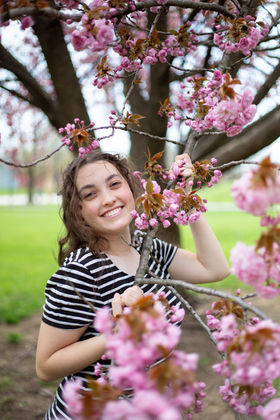 Portrait session outdoors under blooming tree