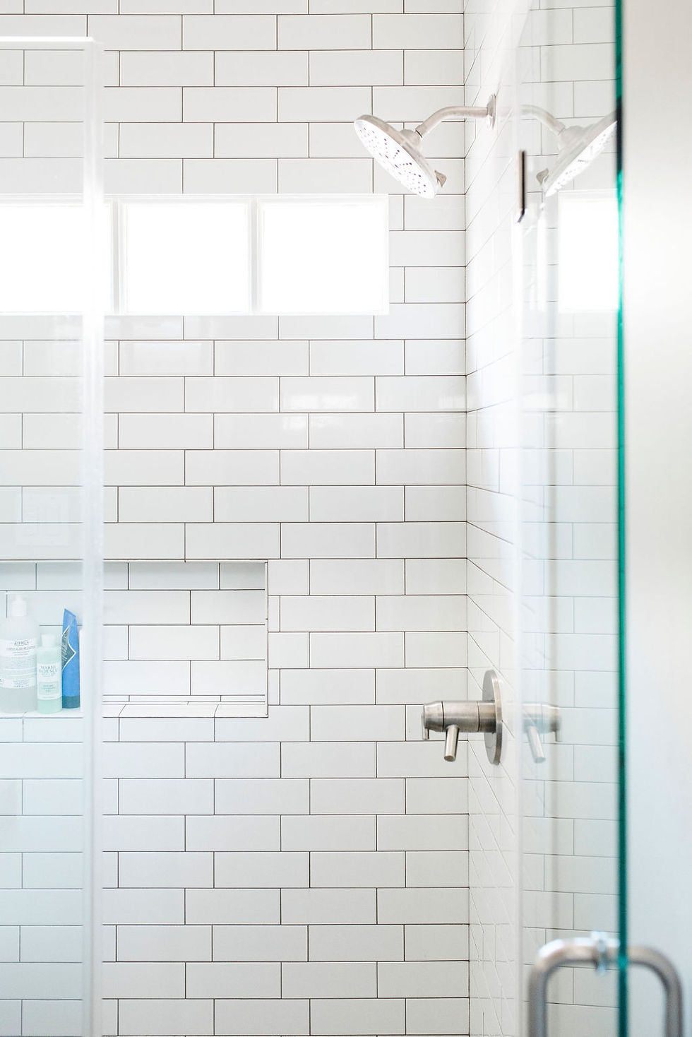 Updated transitional bathroom by Houston interior design firm Nancy Lane Interiors.