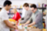 peole volunteering at a food bank