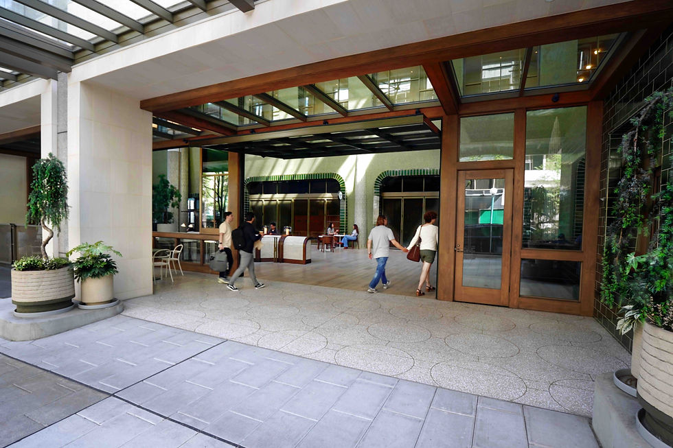 Custom steel tilt-up door and multi-slide pass-through window open Cedar Hall directly to the sidewalk in downtown Seattle.