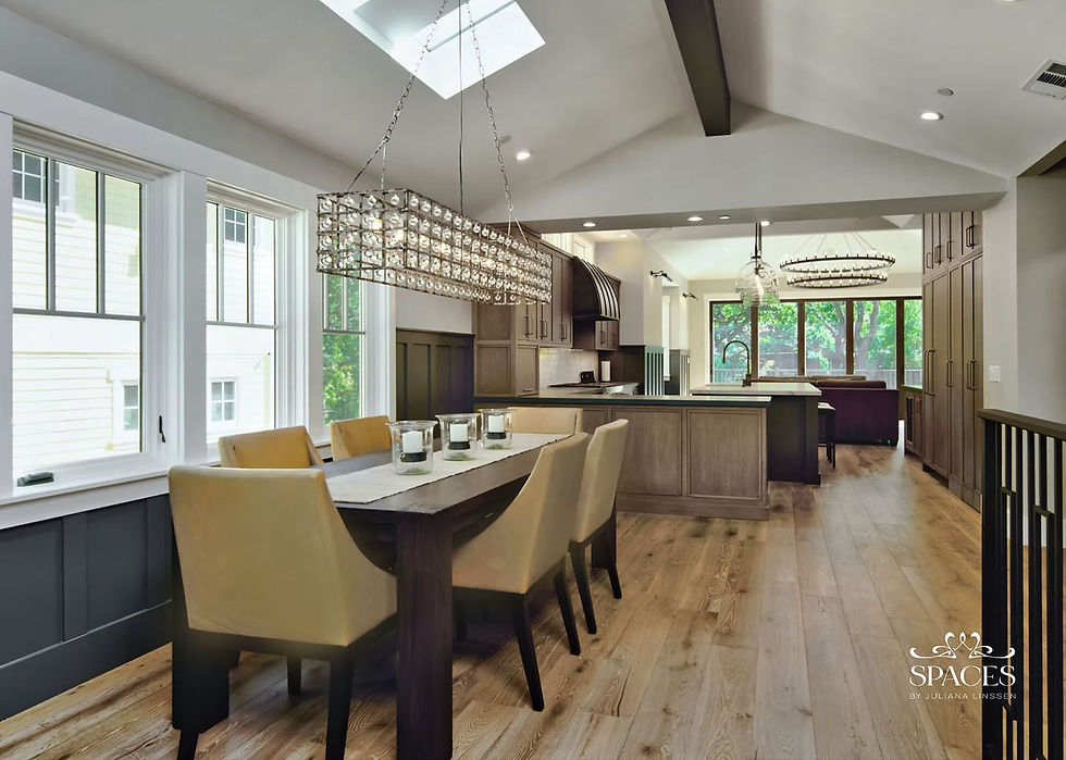Open concept Bay Area kitchen and dining room with custom cabinetry, statement crystal chandelier, and hardwood flooring