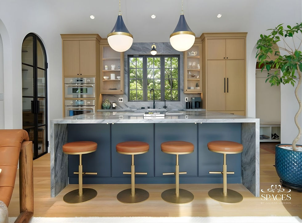 Navy kitchen island with grey quartzite waterfall countertop and leather barstools in a Los Gatos ADU designed by Spaces by Juliana Linssen