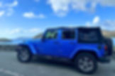 A jeep overlooks the ocean in St. John