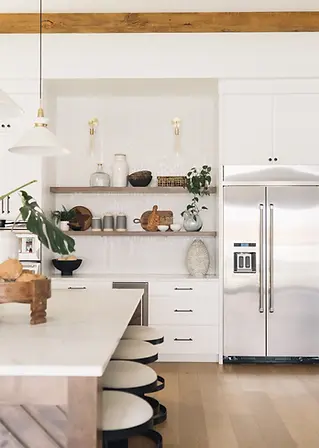 Modern kitchen in the 2021 “Ohana” Street of Dreams home, with clean lines, high-end finishes, and interior styling by Greyly