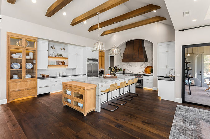 Luxury kitchen designed by Greylyn Wayne for the Street of Dreams, featuring high-end finishes, custom cabinetry, and a sophisticated modern aesthetic.