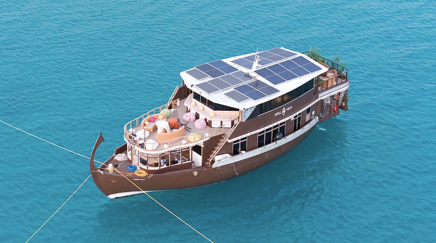 Atoll villa yacht Maldives.jpg