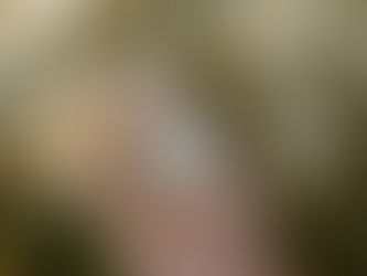 San Juan Summer perfume in a field of daisies and natural light