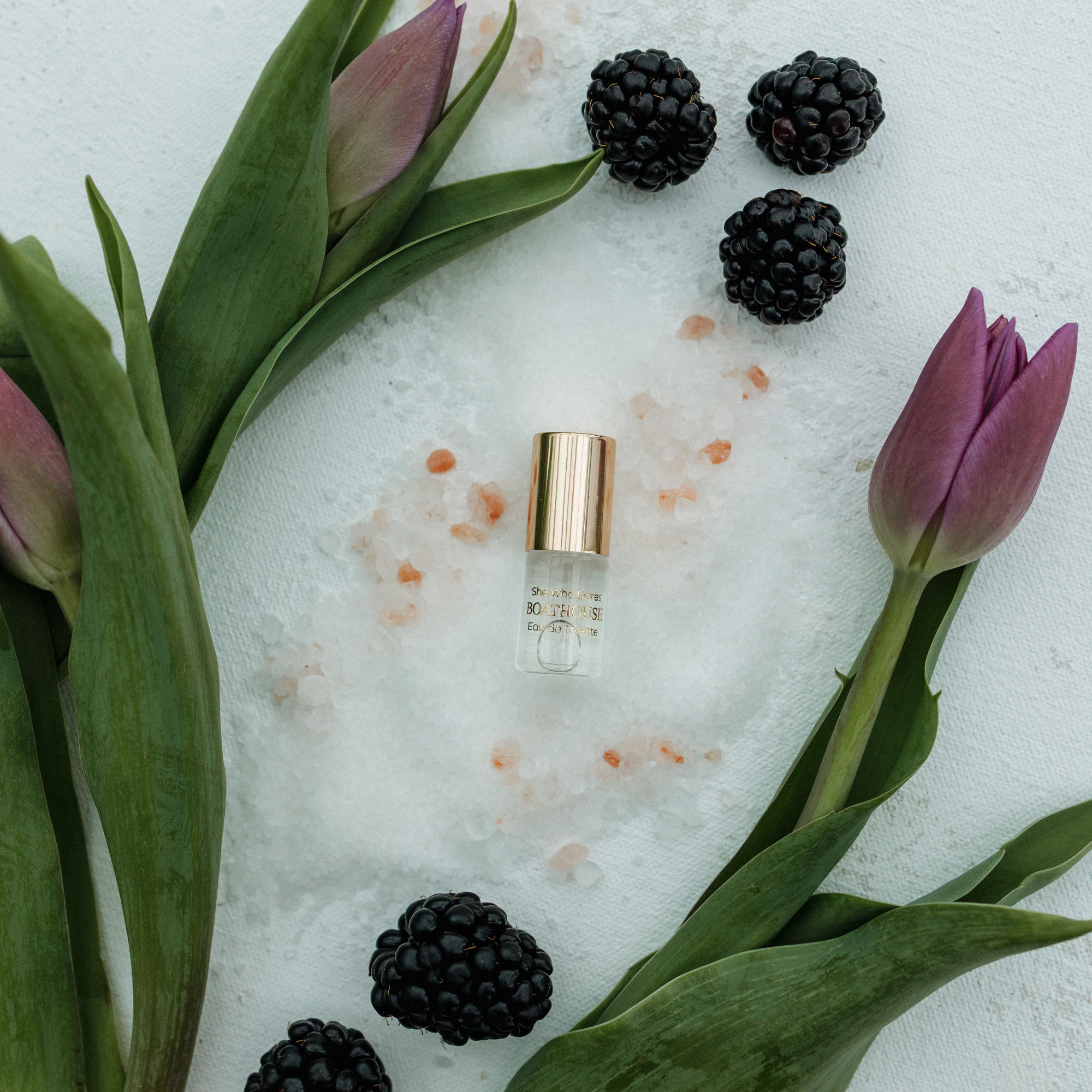 Mini perfume oil roll-on in She Who Dares scent, 3 ml embossed glass bottle with stainless steel roller ball