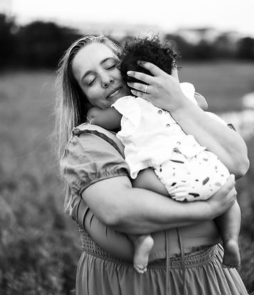 Charlotte, NC Breastfeeding mom hugging daughter