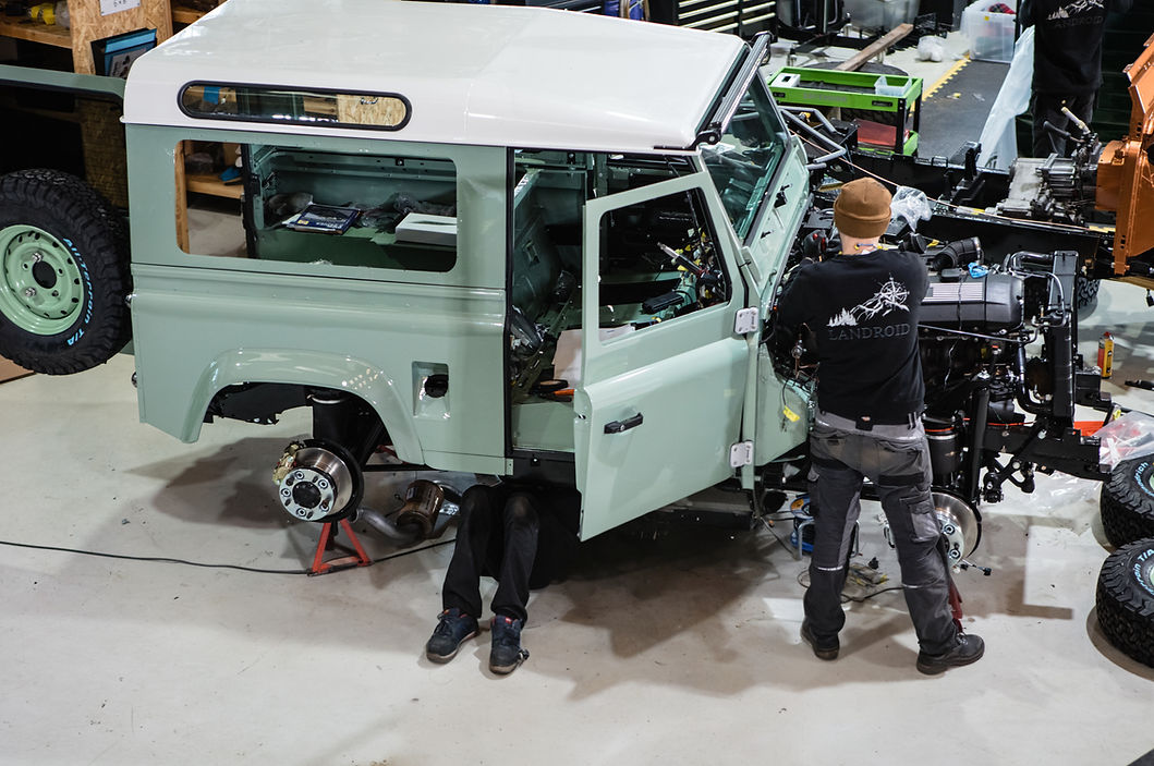 Landroid Motors team restoring a Land Rover Defender with a galvanised chassis and new engine installation