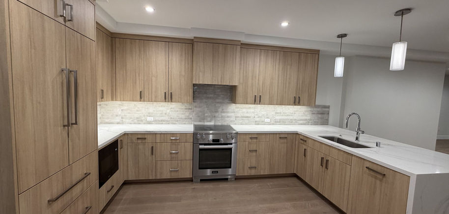Light oak U-shaped custom kitchen with flat-panel cabinets in Danville, CA
