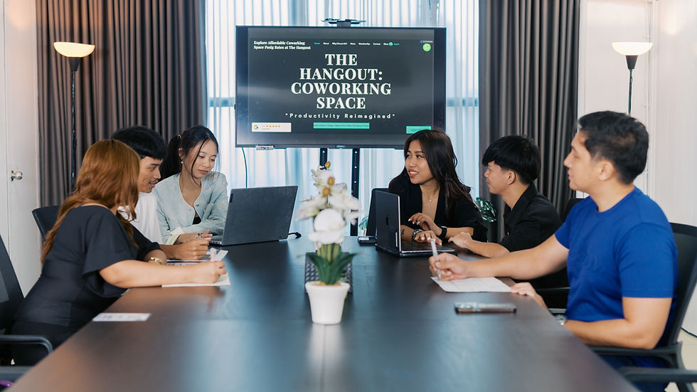 Wide angle view of a modern meeting room set up for a small group discussion