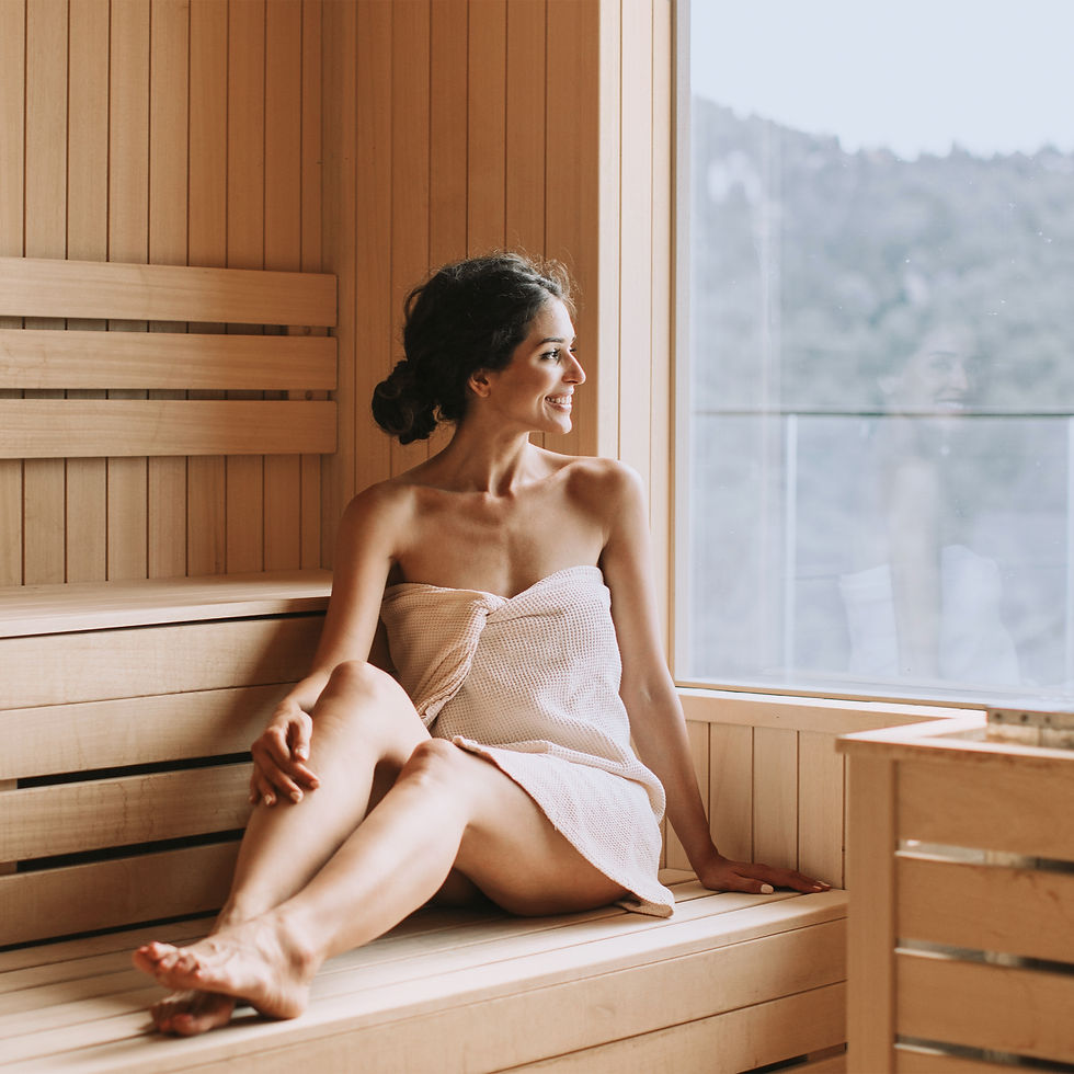 Woman experiencing sauna heat therapy for regeneration, stress recovery, energy renewal, and healthy ageing.