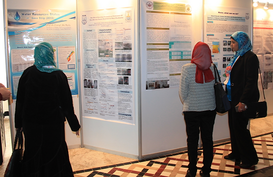 Students looking at Posters