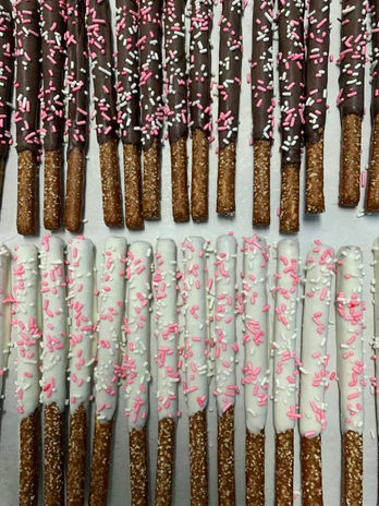 Pretzels covered in dark and white chocolate, allergen friendly desserts for holidays 