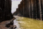 Stuðlagil river canyon in Iceland with basalt columns formed by lava