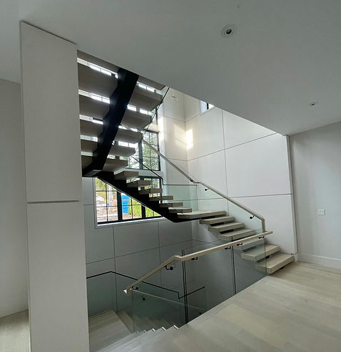 Luxury floating steel stairs fabricated for a custom home in the Seattle area.