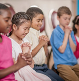 Children Praying Together